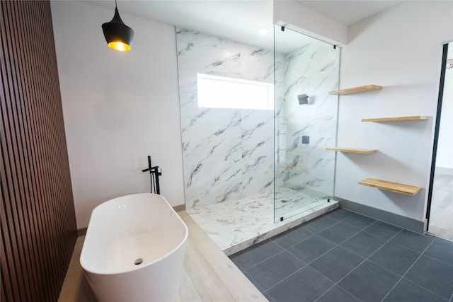 1053 W 15th 1/2 St, Houston, TX 77008 - bathroom featuring a marble finish shower and tile patterned floors