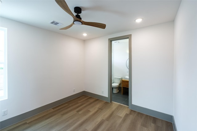 1053 W 15th 1/2 St, Houston, TX 77008 - unfurnished bedroom with light wood-style flooring, recessed lighting, connected bathroom, and ceiling fan