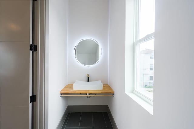 1053 W 15th 1/2 St, Houston, TX 77008 - bathroom with plenty of natural light and tile patterned floors