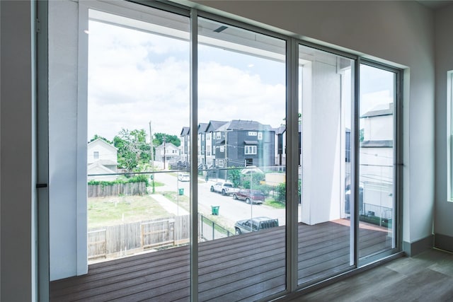 1053 W 15th 1/2 St, Houston, TX 77008 - entryway with wood finished floors and a residential view