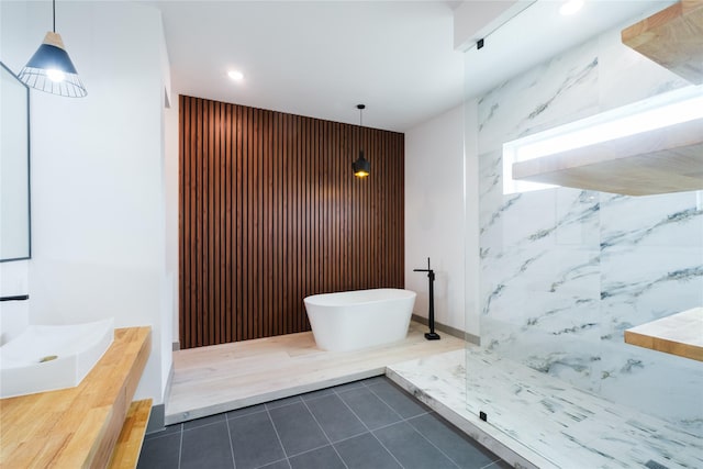 1053 W 15th 1/2 St, Houston, TX 77008 - bathroom featuring vanity, a soaking tub, recessed lighting, tile patterned floors, and a shower