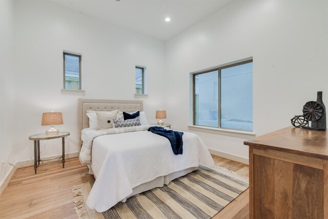 1414 Wichman St, Houston, TX 77007 - bedroom featuring light wood-type flooring, baseboards, and recessed lighting