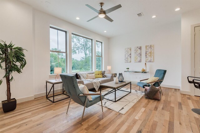 1414 Wichman St, Houston, TX 77007 - living room with light wood finished floors, recessed lighting, ceiling fan, and baseboards
