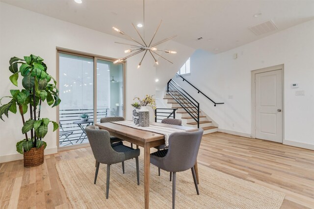 1414 Wichman St, Houston, TX 77007 - dining room featuring stairs, a chandelier, light wood-style flooring, baseboards, and recessed lighting