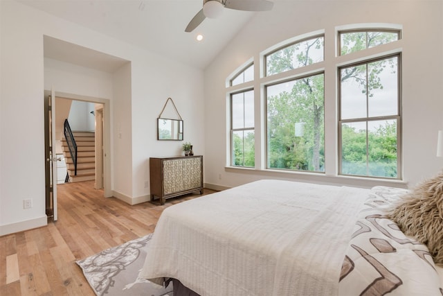 1414 Wichman St, Houston, TX 77007 - bedroom with light wood-type flooring, baseboards, ceiling fan, high vaulted ceiling, and recessed lighting