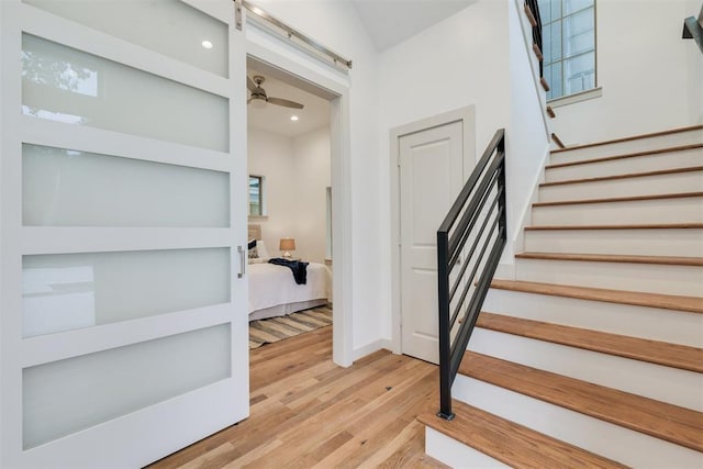 1414 Wichman St, Houston, TX 77007 - staircase featuring wood finished floors, recessed lighting, and ceiling fan