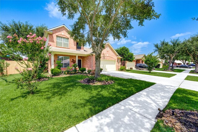 2714 San Marco Ln, League City, TX 77573 - traditional-style home with driveway, an attached garage, and brick siding