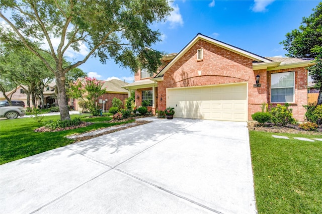 2714 San Marco Ln, League City, TX 77573 - view of front of home with a garage, brick siding, concrete driveway, and a front lawn