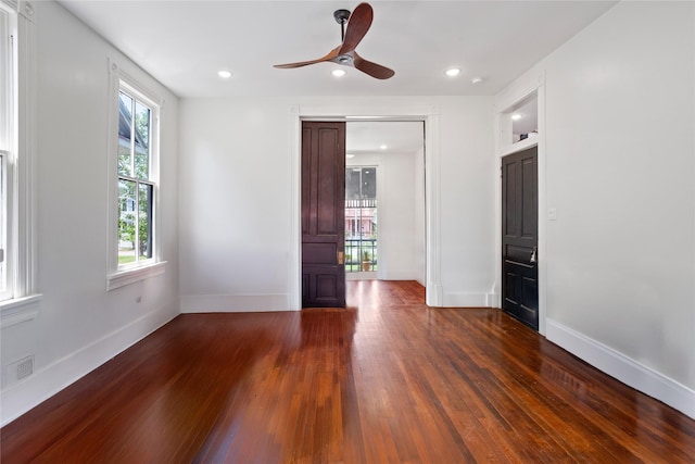 1416 Rosenberg St, Galveston, TX 77550 - spare room with dark wood-style flooring, ceiling fan, baseboards, and recessed lighting