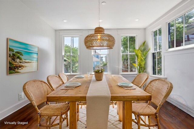 1416 Rosenberg St, Galveston, TX 77550 - dining space with wood finished floors, plenty of natural light, and baseboards