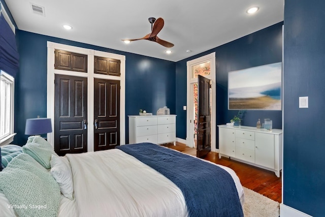 1416 Rosenberg St, Galveston, TX 77550 - bedroom with wood finished floors, recessed lighting, a ceiling fan, and baseboards