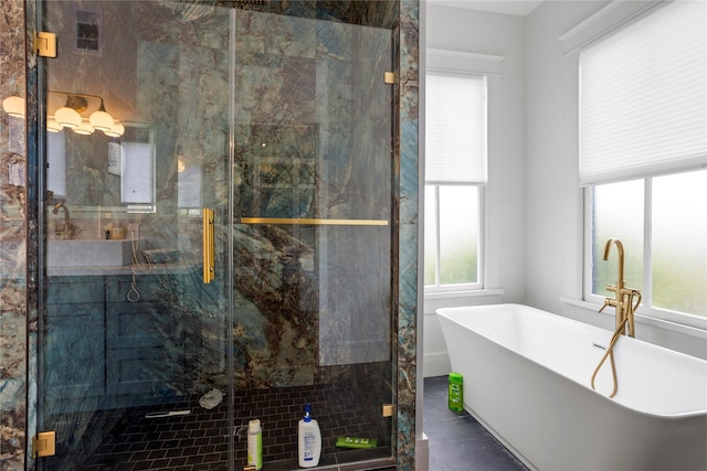 1416 Rosenberg St, Galveston, TX 77550 - full bath featuring a marble finish shower and a freestanding tub