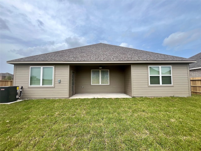 14008 Starboard Reach Dr, Texas City, TX 77510 - back of house featuring a patio and a shingled roof