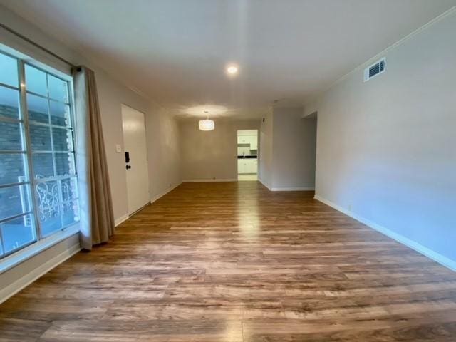 2121 Fountain View Dr Unit 8, Houston, TX 77057 - spare room with wood finished floors and baseboards