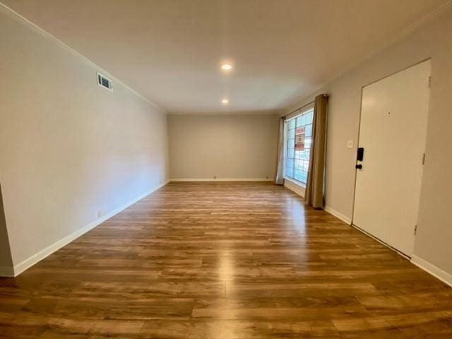 2121 Fountain View Dr Unit 8, Houston, TX 77057 - empty room featuring wood finished floors, recessed lighting, and baseboards