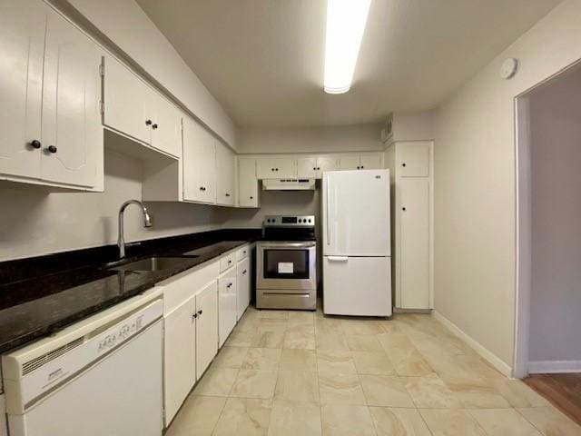 2121 Fountain View Dr Unit 8, Houston, TX 77057 - kitchen with white appliances, a sink, white cabinetry, ventilation hood, and baseboards
