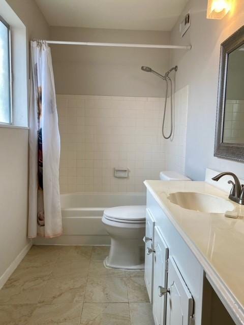 2121 Fountain View Dr Unit 8, Houston, TX 77057 - bathroom with vanity, shower / bath combo, toilet, and baseboards