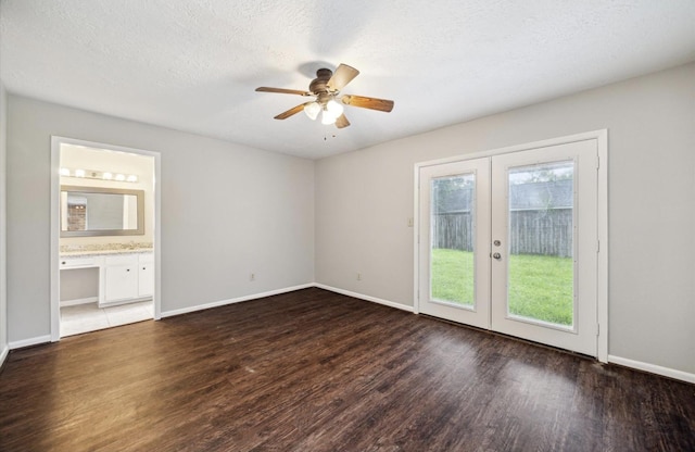 25903 Long Hill Ln, Spring, TX 77373 - spare room with french doors, wood finished floors, ceiling fan, baseboards, and a textured ceiling