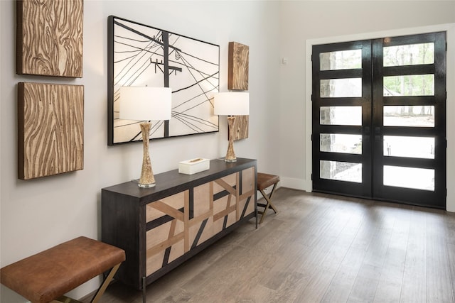 21742 Grayson Highlands Way, Porter Heights, TX 77365 - entryway with plenty of natural light, wood finished floors, french doors, and baseboards