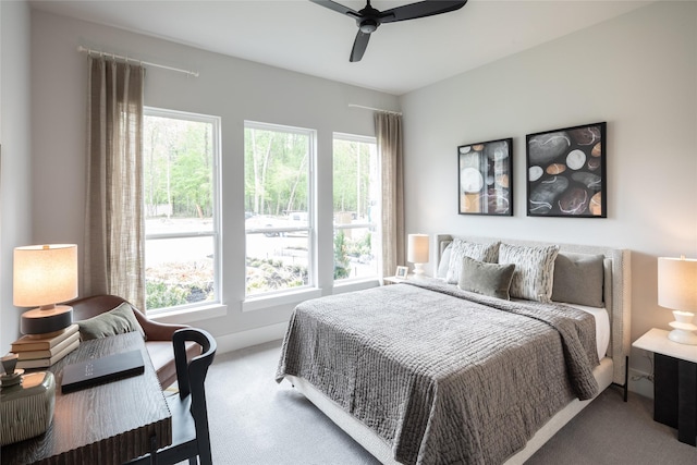 21742 Grayson Highlands Way, Porter Heights, TX 77365 - bedroom featuring carpet floors and a ceiling fan