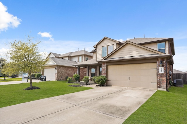 3014 Mcdonough Way, Katy, TX 77494 - view of front of property featuring brick siding, central AC unit, concrete driveway, and a front yard