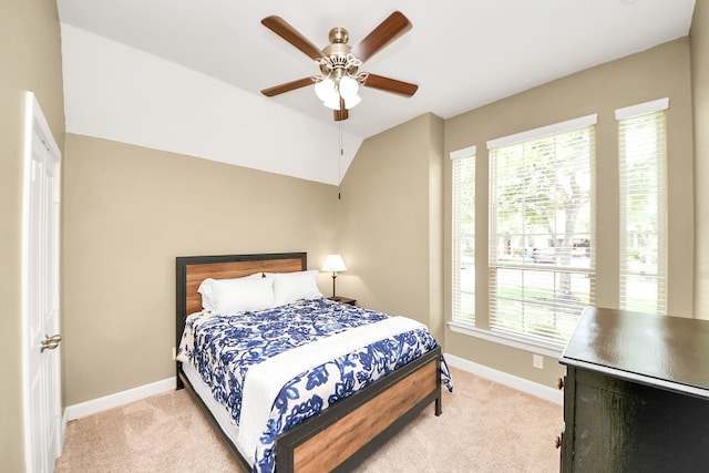 14006 Alex Landing Dr, Humble, TX 77396 - carpeted bedroom featuring multiple windows, baseboards, and a ceiling fan