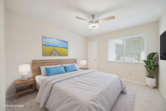 16403 Wellers Way, Houston, TX 77095 - carpeted bedroom with baseboards and a ceiling fan
