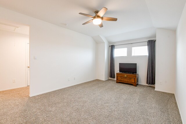 12324 Carib Crossing Ln, Conroe, TX 77304 - unfurnished living room with attic access, ceiling fan, light colored carpet, and lofted ceiling