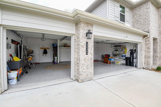 12324 Carib Crossing Ln, Conroe, TX 77304 - garage featuring driveway