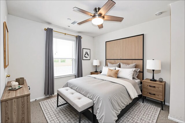 12324 Carib Crossing Ln, Conroe, TX 77304 - bedroom with light colored carpet, baseboards, and a ceiling fan
