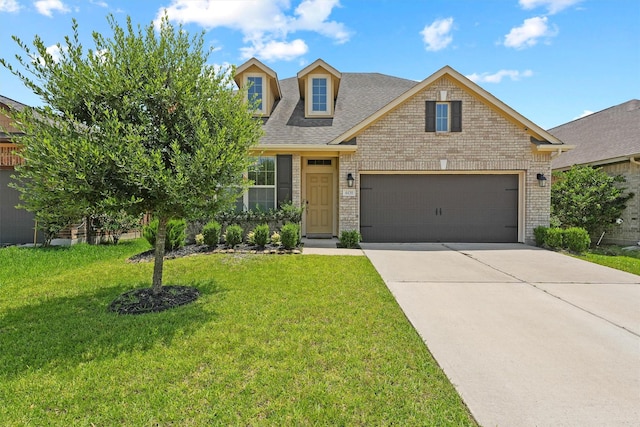 4430 Lone Alcove Dr, Spring, TX 77386 - view of front of house featuring brick siding, an attached garage, driveway, a front lawn, and a shingled roof