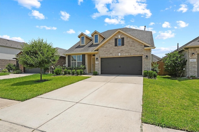 4430 Lone Alcove Dr, Spring, TX 77386 - traditional home with brick siding, concrete driveway, and a front yard