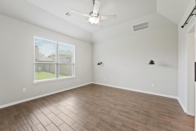 4430 Lone Alcove Dr, Spring, TX 77386 - spare room with a ceiling fan, vaulted ceiling, wood finished floors, and baseboards