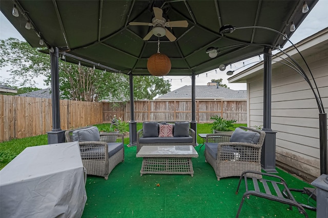 211 Aberdeen St, Stafford, TX 77477 - fenced backyard featuring an outdoor living space and a gazebo
