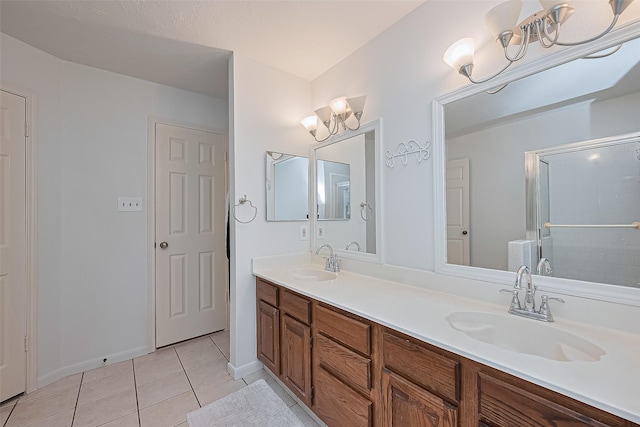 211 Aberdeen St, Stafford, TX 77477 - bathroom with tile patterned flooring, double vanity, and a shower with door