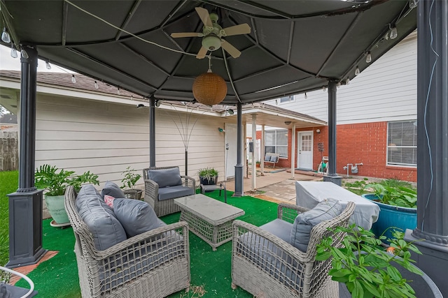 211 Aberdeen St, Stafford, TX 77477 - view of patio featuring an outdoor hangout area, a gazebo, and a ceiling fan