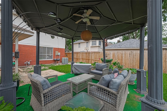 211 Aberdeen St, Stafford, TX 77477 - view of patio / terrace featuring an outdoor living space, a gazebo, and a ceiling fan