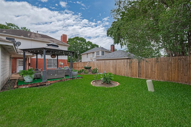 211 Aberdeen St, Stafford, TX 77477 - fenced backyard with a gazebo and an outdoor hangout area