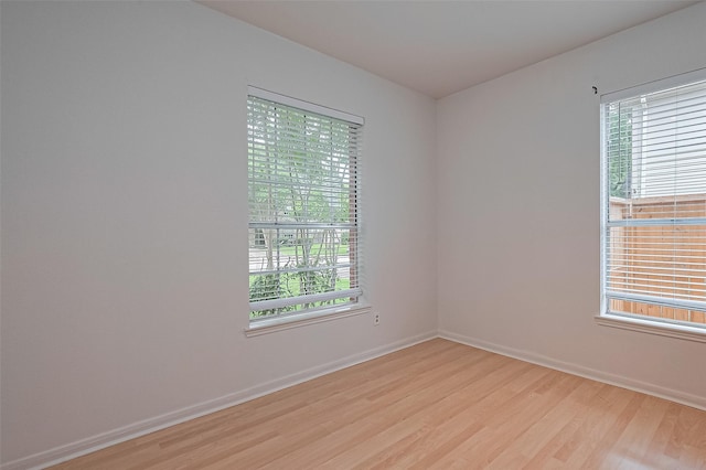 211 Aberdeen St, Stafford, TX 77477 - unfurnished room featuring light wood-style flooring and baseboards