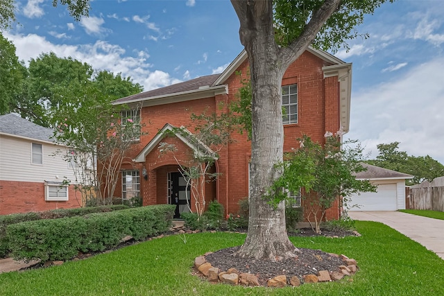 211 Aberdeen St, Stafford, TX 77477 - traditional home featuring brick siding, concrete driveway, and an attached garage