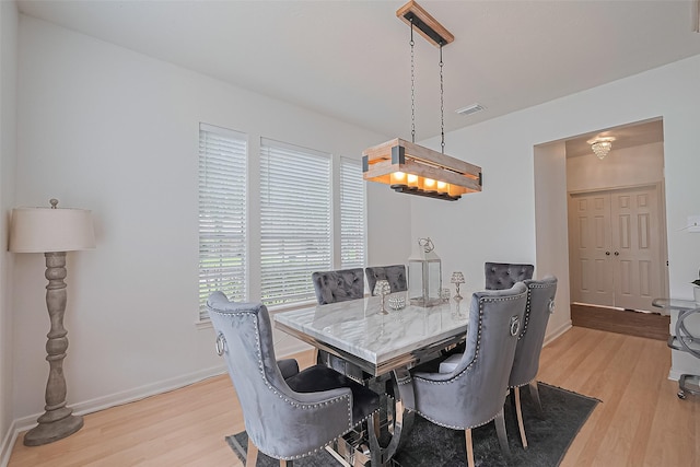 211 Aberdeen St, Stafford, TX 77477 - dining space featuring light wood-style floors