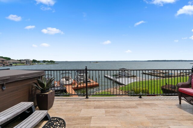 2117 Gunwale Cir, Willis, TX 77318 - view of patio / terrace featuring a balcony and a water view