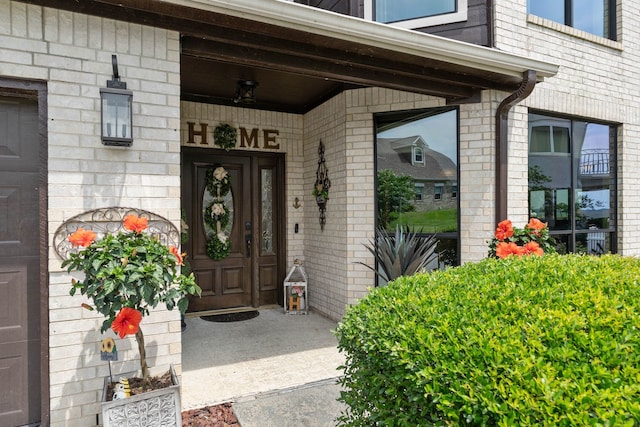 2117 Gunwale Cir, Willis, TX 77318 - property entrance featuring brick siding and a porch