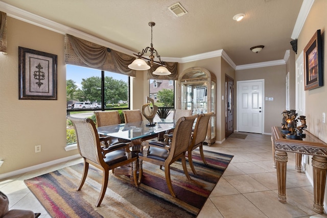 2117 Gunwale Cir, Willis, TX 77318 - dining space with crown molding, light tile patterned floors, baseboards, and a chandelier