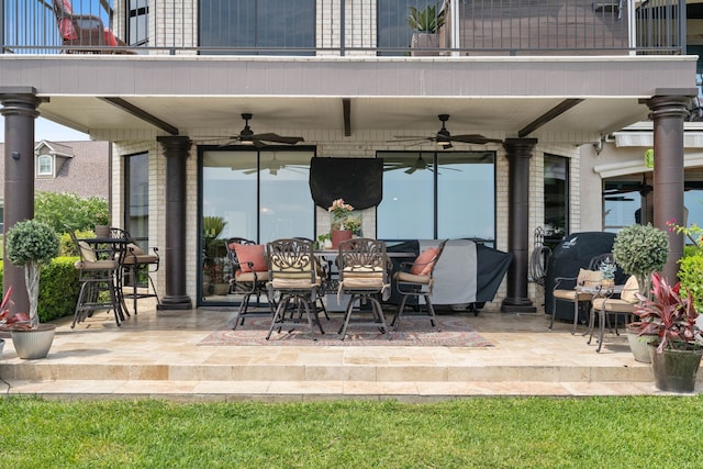 2117 Gunwale Cir, Willis, TX 77318 - view of patio / terrace featuring a balcony, ceiling fan, and outdoor dining space