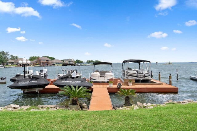 2117 Gunwale Cir, Willis, TX 77318 - dock featuring a water view and boat lift