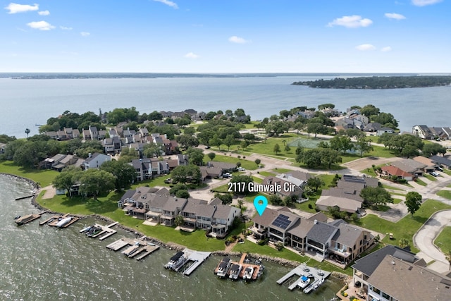 2117 Gunwale Cir, Willis, TX 77318 - aerial overview of property's location featuring a large body of water and nearby suburban area