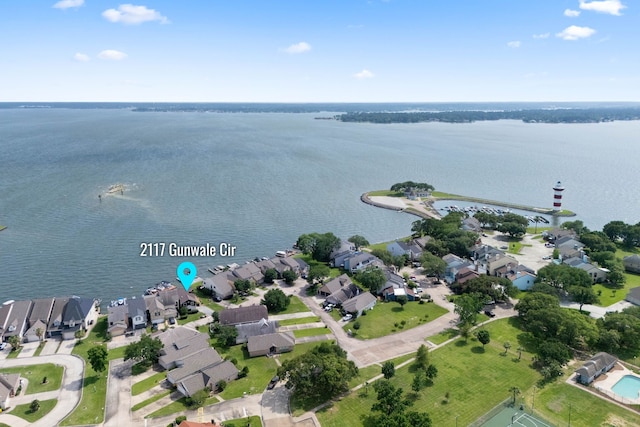 2117 Gunwale Cir, Willis, TX 77318 - aerial view of property and surrounding area with nearby suburban area and a large body of water