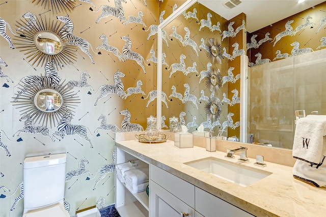 2221 Welch St Unit 601, Houston, TX 77019 - bathroom with vanity, toilet, and a shower with shower door