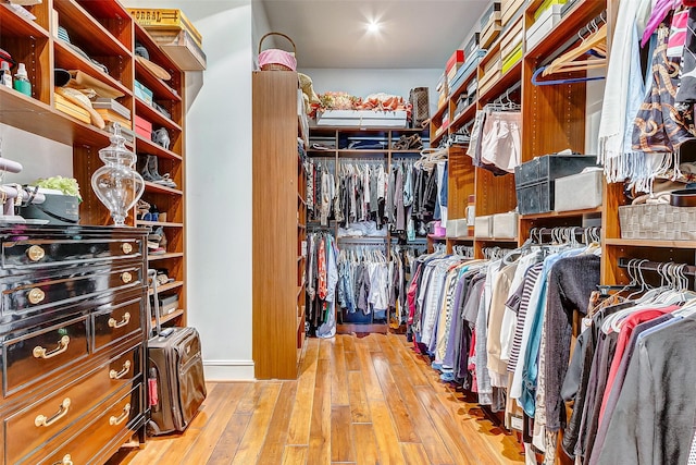 2221 Welch St Unit 601, Houston, TX 77019 - walk in closet featuring hardwood / wood-style flooring